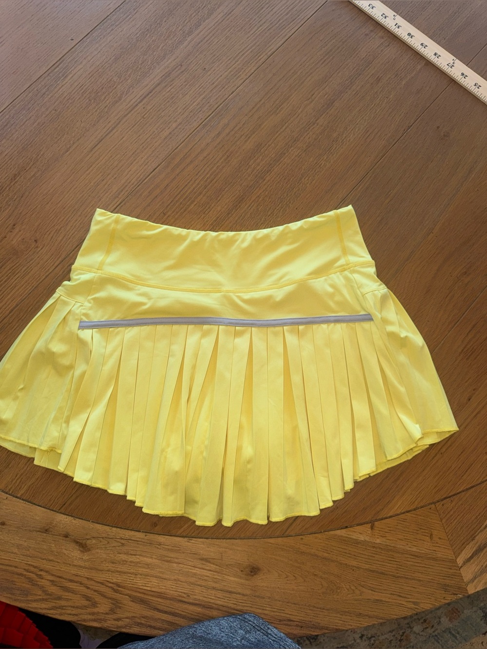 Yellow Pleated Athletic Skirt with Reflective Trim